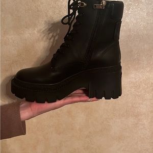 These are black coach boots. Never worn because they are too small for me.
